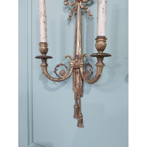 194 - Pair of good quality early 20th C. gilded brass French wall sconces {59 cm H x 27 cm W x 12 cm D}.