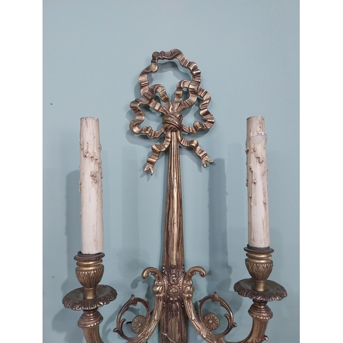 194 - Pair of good quality early 20th C. gilded brass French wall sconces {59 cm H x 27 cm W x 12 cm D}.