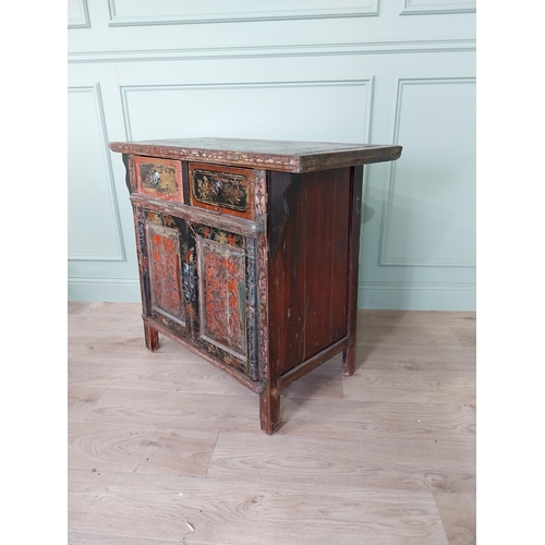 196 - Oriental painted hardwood side cabinet with two short drawers over two blind doors raised on square ... 