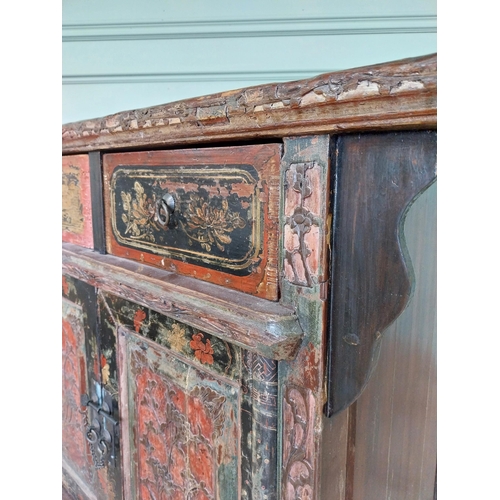 196 - Oriental painted hardwood side cabinet with two short drawers over two blind doors raised on square ... 