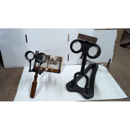 2013 - Two viewers, one handheld metal and wood viewer and one metal table top viewer