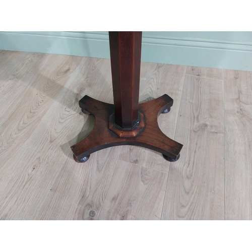 203 - 19th C. mahogany and rosewood cross banned lamp table raised on turned column and four out swept fee... 