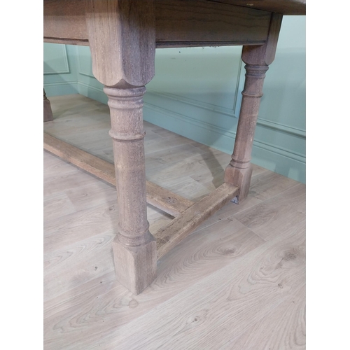 205 - Early 20th C. French bleached oak kitchen table raised on turned legs and single stretcher {76 cm H ... 