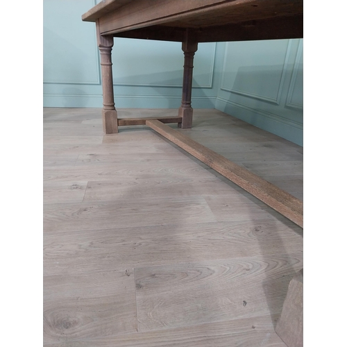 205 - Early 20th C. French bleached oak kitchen table raised on turned legs and single stretcher {76 cm H ... 