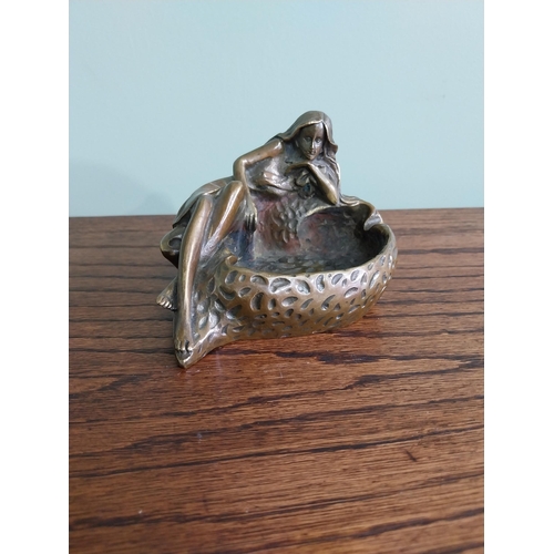 207 - Art Nouveau bronze ashtray in the form of a Lady {10 cm H x 14 cm W x 10 cm D}.