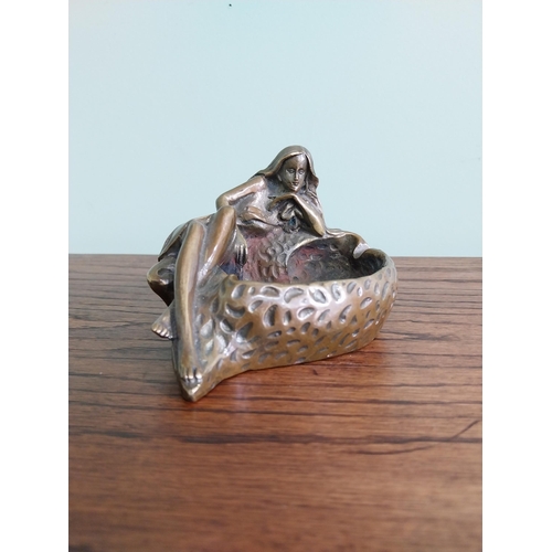 207 - Art Nouveau bronze ashtray in the form of a Lady {10 cm H x 14 cm W x 10 cm D}.