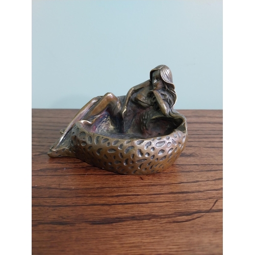 207 - Art Nouveau bronze ashtray in the form of a Lady {10 cm H x 14 cm W x 10 cm D}.