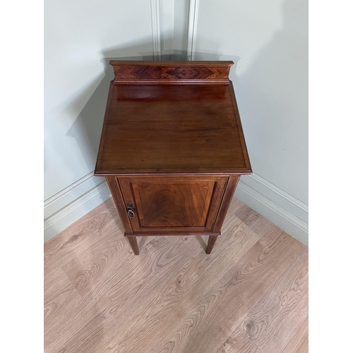 212 - Edwardian mahogany and ebonised inlaid pot cupboard with single door raised on square tapered legs {... 