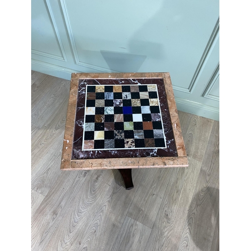 221 - William IV mahogany chess table with specimen marble top raised on turned column and platform base {... 