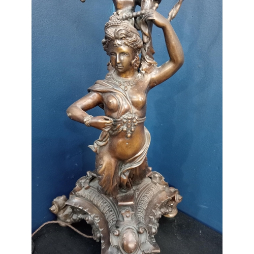 224 - Bronze lamp in the form of a classical female figure and cherub on an ornate base {H 100cm x W 40cm ... 