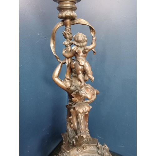 224 - Bronze lamp in the form of a classical female figure and cherub on an ornate base {H 100cm x W 40cm ... 