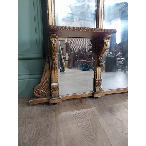 228 - 19th C. giltwood over mantle mirror decorated with central mask and swags {120 cm H x 124 cm W}.