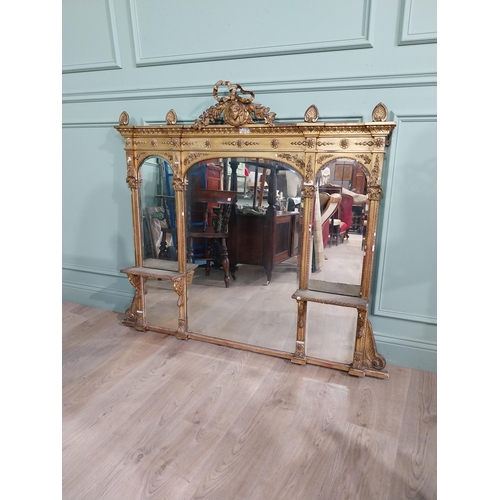 228 - 19th C. giltwood over mantle mirror decorated with central mask and swags {120 cm H x 124 cm W}.