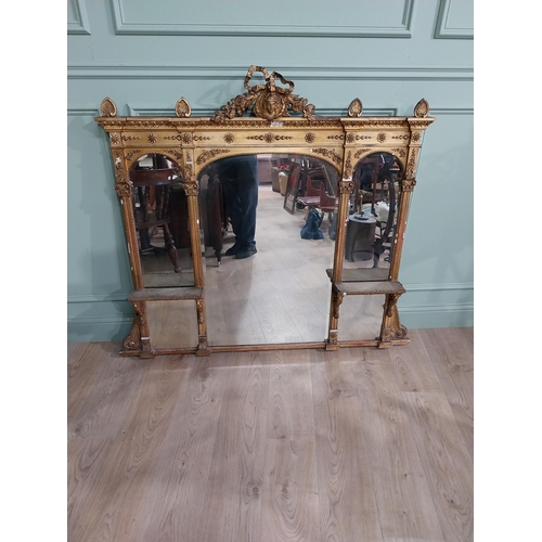 228 - 19th C. giltwood over mantle mirror decorated with central mask and swags {120 cm H x 124 cm W}.