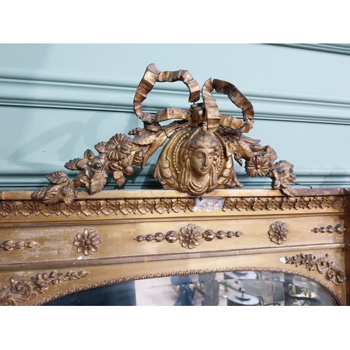 228 - 19th C. giltwood over mantle mirror decorated with central mask and swags {120 cm H x 124 cm W}.