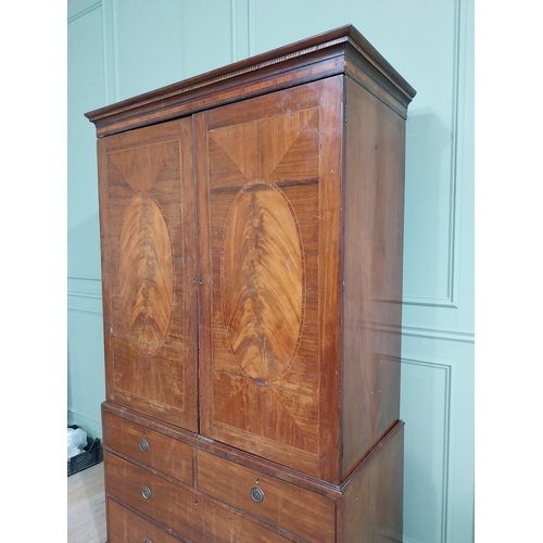 233 - Georgian mahogany and satinwood linen press with two doors {214 cm H x 127 cm W}.