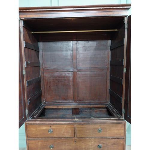 233 - Georgian mahogany and satinwood linen press with two doors {214 cm H x 127 cm W}.