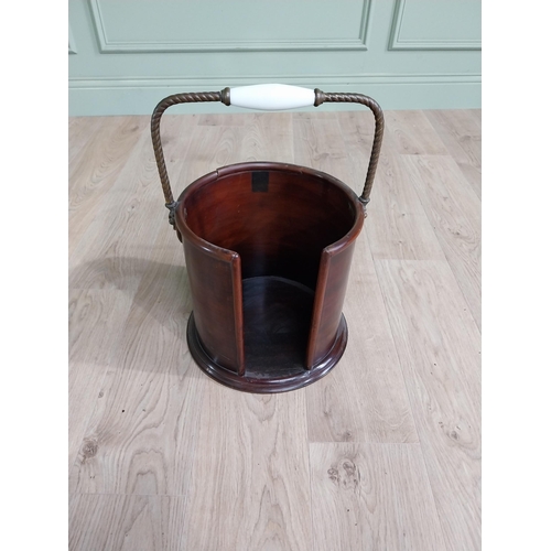 243 - Irish Georgian mahogany and brass plate bucket. {51 cm H x 34 cm Dia.}.