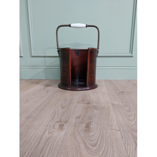 243 - Irish Georgian mahogany and brass plate bucket. {51 cm H x 34 cm Dia.}.