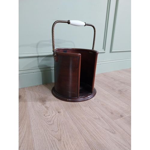 243 - Irish Georgian mahogany and brass plate bucket. {51 cm H x 34 cm Dia.}.