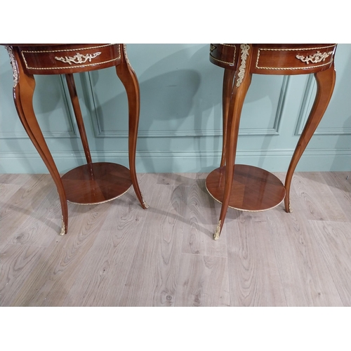 250 - Pair of French Kingwood lamp tables with ormolu mounts raised on cabriole legs {80 cm H x 47 cm Dia}... 