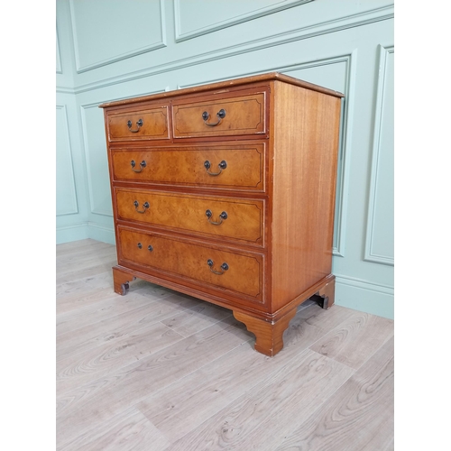 261 - Inlaid yew wood chest of drawers with two short drawers over three long graduated drawers raised on ... 