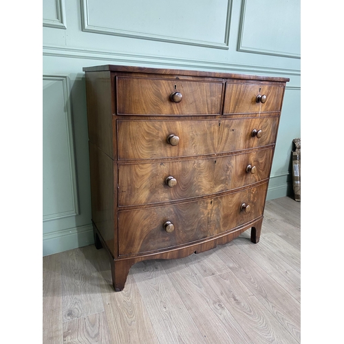 275 - 19th C. flamed mahogany bow fronted chest of drawers with two short drawers over three graduated dra... 