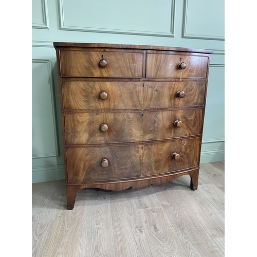 275 - 19th C. flamed mahogany bow fronted chest of drawers with two short drawers over three graduated dra... 