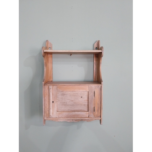 276 - Early 20th C. pine wall cabinet with single door {56 cm H x 38 cm W x 14 cm D}.