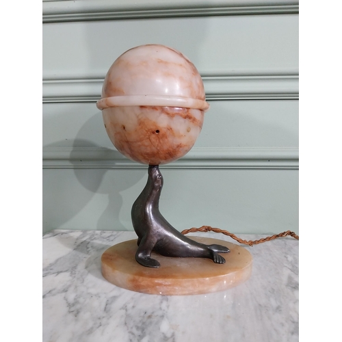 29 - Art Deco alabaster and bronzed spelter table lamp in the form of a Seal {30 cm H x 21 cm W x 14 cm D... 