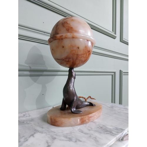 29 - Art Deco alabaster and bronzed spelter table lamp in the form of a Seal {30 cm H x 21 cm W x 14 cm D... 