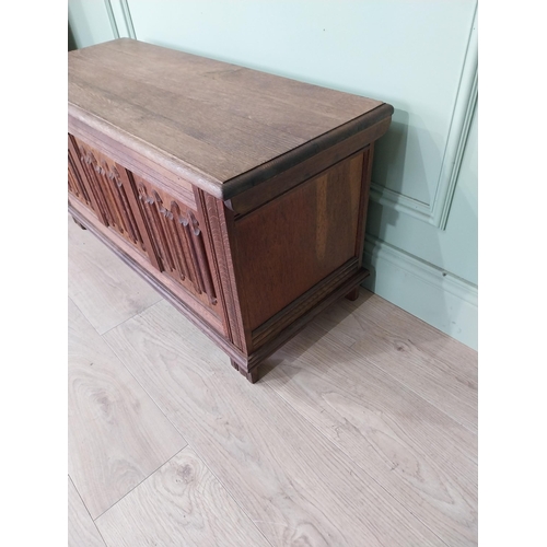 296 - Oak blanket box in the Tudor style {47 cm H x 94 cm W x 38 cm D}.