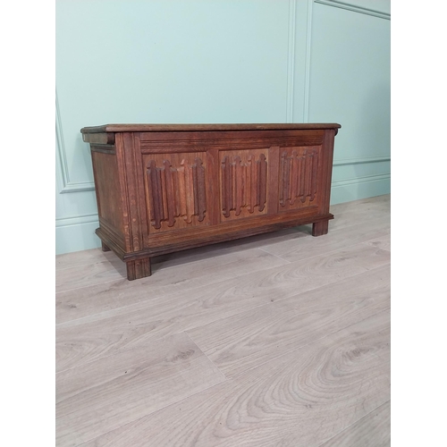 296 - Oak blanket box in the Tudor style {47 cm H x 94 cm W x 38 cm D}.