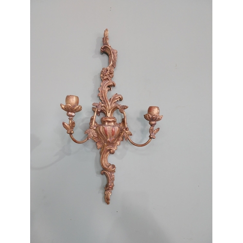 297 - Pair of giltwood wall lights in the Rococo manner. {64 cm H x 32 cm W x 17 cm W}.