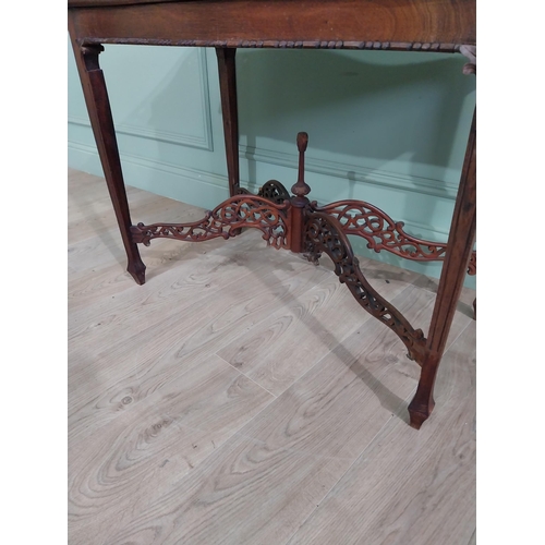 298 - Georgian mahogany tea table in the Chippendale style with pierced gallery raised on four tapered leg... 