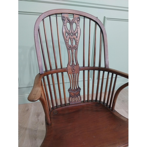 30 - Good quality mahogany Windsor armchair raised on cabriole legs {103 cm H x 60 cm W x 50 cm D}.