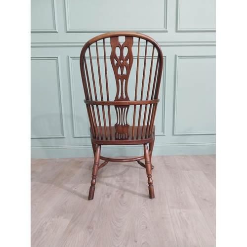 30 - Good quality mahogany Windsor armchair raised on cabriole legs {103 cm H x 60 cm W x 50 cm D}.