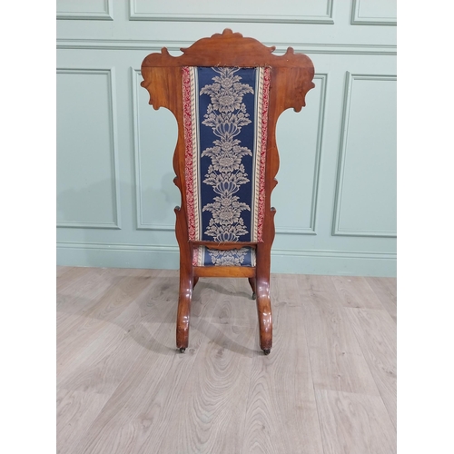 309 - William IV carved walnut and upholstered nursing chair raised on cabriole legs and brass castors {20... 