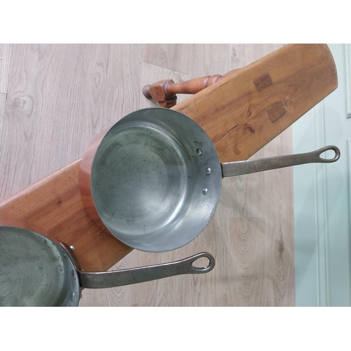 314 - Set of five good quality graduated French copper saucepans with wrought iron handles {17 cm H x 34 c... 