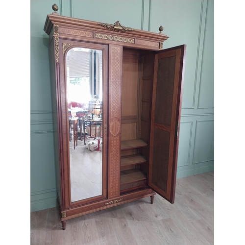 319 - 19th C. French kingwood wardrobe with two mirrored doors and ormolu mounts raised on turned feet {23... 