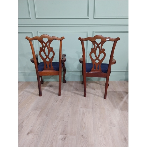 323 - Pair of carved mahogany open armchairs with upholstered seats raised on cabriole legs in the Chippen... 