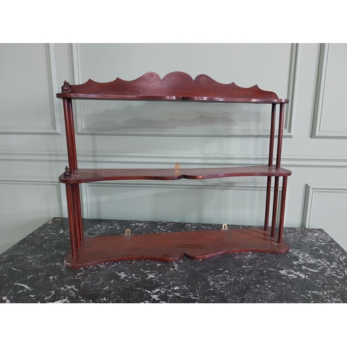 329 - 19th C. mahogany waterfall serpentine front wall shelves {68 cm H x 84 cm W  x 17 cm D}.