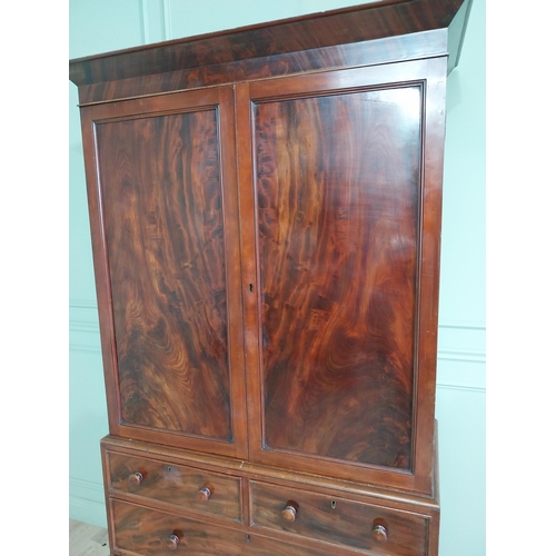 341 - Early 19th C. mahogany linen press with two blind doors over two short drawers above two long drawer... 