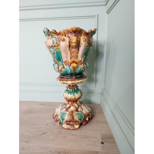 343 - Good quality 19th C. ceramic jardiniere on stand in the Majolica style {86 cm H x 50 cm Dia}.