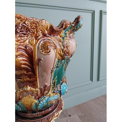 343 - Good quality 19th C. ceramic jardiniere on stand in the Majolica style {86 cm H x 50 cm Dia}.