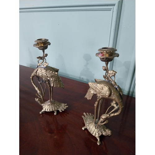 345 - Pair of Oriental brass candlesticks in the form of Cranes mounted on Tortoises {27 cm H x 14 cm W x ... 