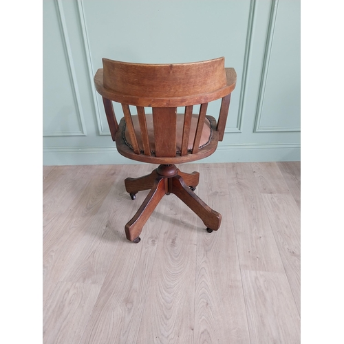 349 - Good quality Edwardian oak revolving office chair with leather upholstered seat {82 cm H x 61 cm W x... 