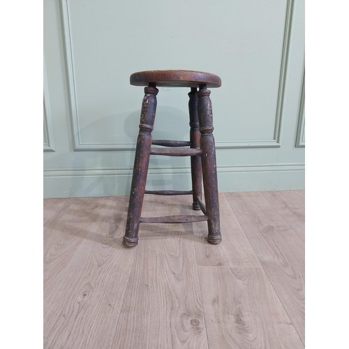 37 - Early 20th C. oak and elm stool raised on turned legs and four stretchers {55 cm H x 33 cm W x 33 cm... 