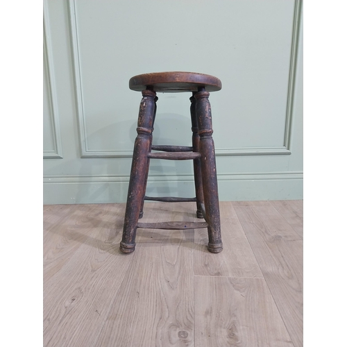 37 - Early 20th C. oak and elm stool raised on turned legs and four stretchers {55 cm H x 33 cm W x 33 cm... 