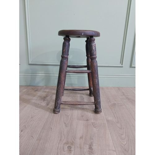 37 - Early 20th C. oak and elm stool raised on turned legs and four stretchers {55 cm H x 33 cm W x 33 cm... 